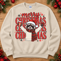 Merry Christmas raccoon design on sand crewneck