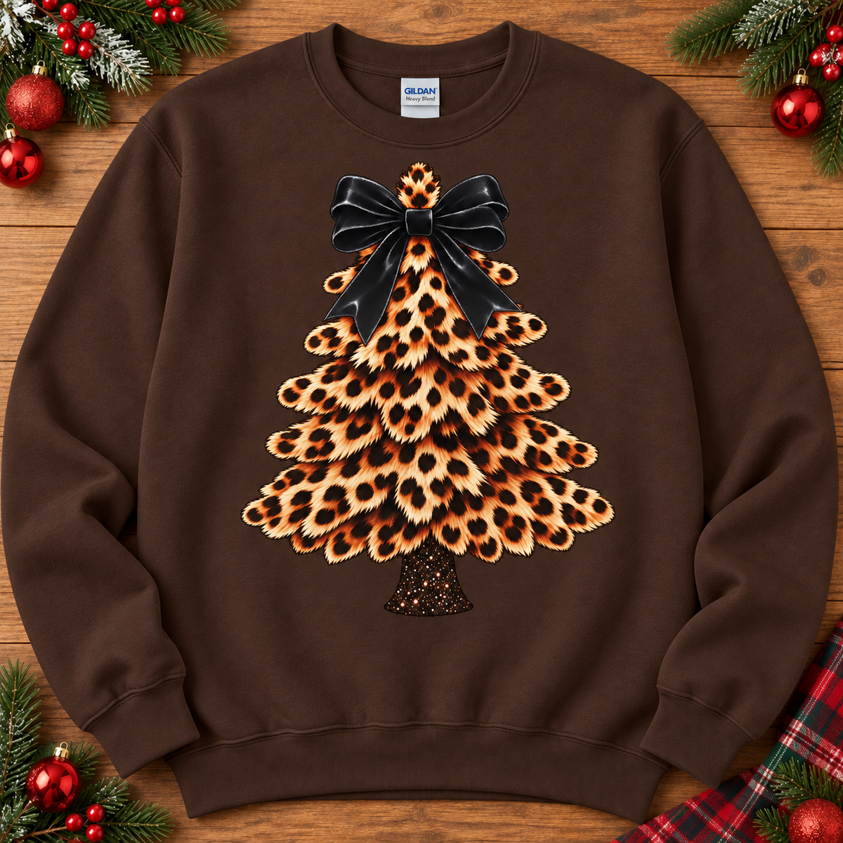 Leopard Christmas tree with black bow on chocolate crewneck