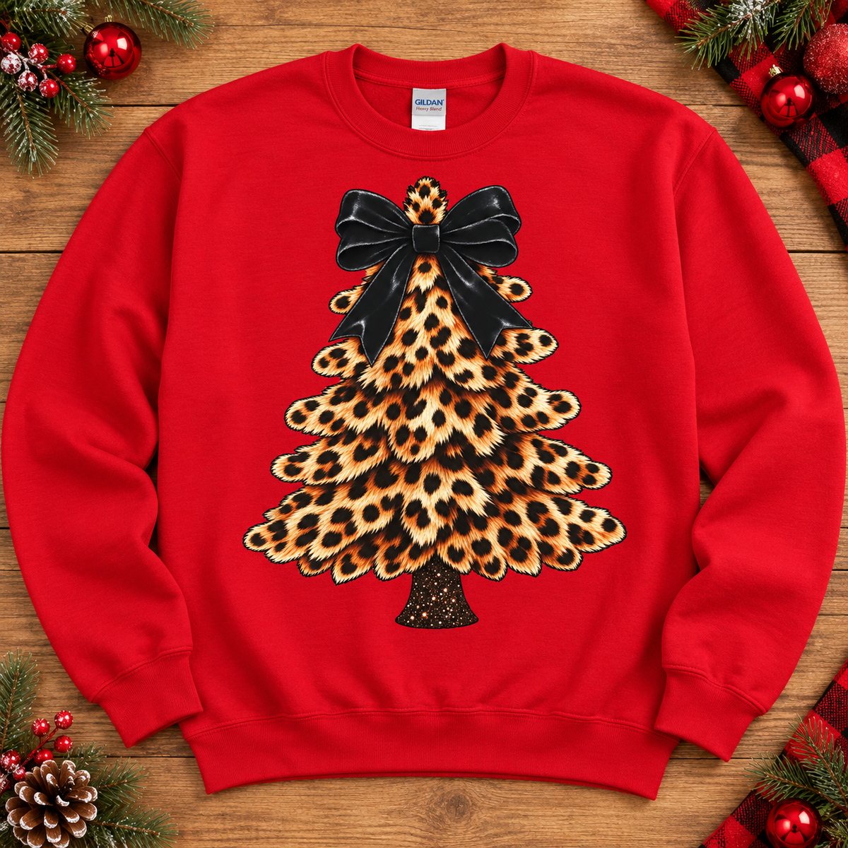 Leopard Christmas tree with black bow on red crewneck