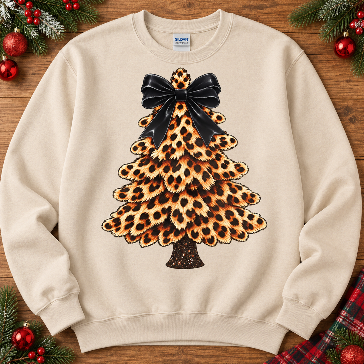 Leopard Christmas tree with black bow on sand crewneck
