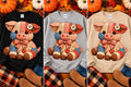 Patchwork pig fall crewneck sweatshirt in black, gray, and sand