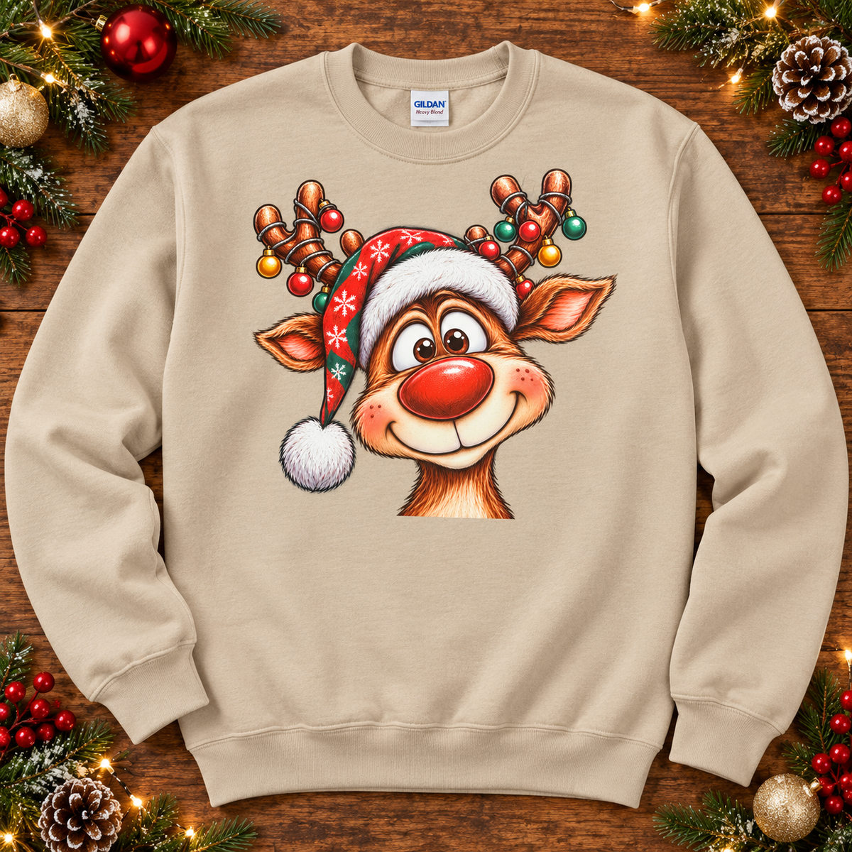 Smiling red-nosed reindeer face Christmas crewneck in Sand